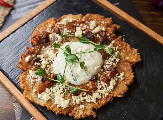 big potato pancake with greaves cheese and sour cream 270